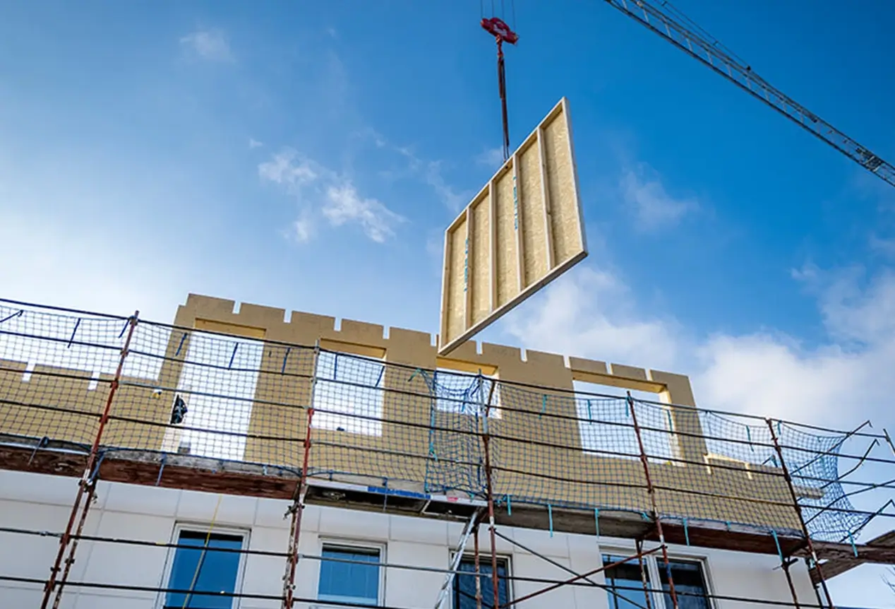 Zubauen und Aufstocken mit Holz